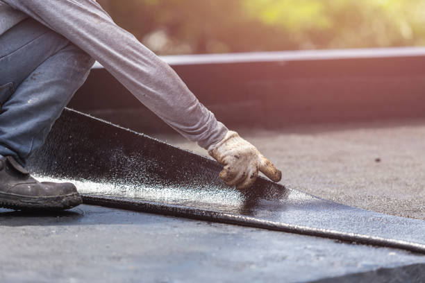 Professional Basement Waterproofing technician working in Sparta, MI